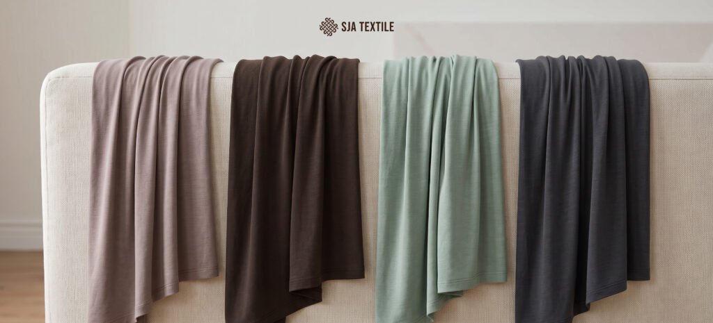 Beda Modal, Micromodal, Bamboo, dan Rayon Spandex, Panduan Memilih Kain Adem untuk Pashmina Lebaran - SJA Textile